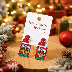 Boucles d'oreilles lutin de Noël festives avec chapeaux rouges, bijoux de fête faits main.