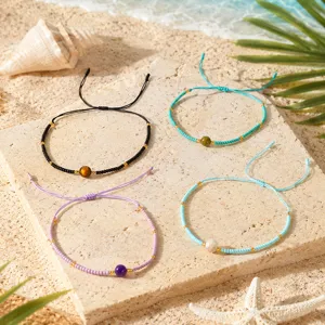 Bracelets de perles bohèmes faits à la main avec cordon réglable et pierre centrale.