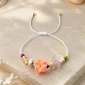 Bracelet perlé de fleurs de plumeria coquillage bohème, cordon ajustable détails.