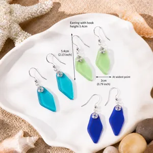 Handcrafted sea glass drop earrings with silver hooks ocean style jewelry for women elegant.