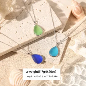 Charming colorful sea glass pendant necklace detail showcasing ocean style teardrop gems.