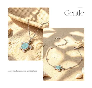 Detail view of turquoise sea turtle necklace and anklet, beach resort style ocean jewelry.