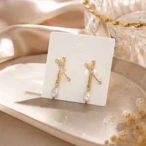 Elegante goldene geometrische Kreuz Perlen Ohrringe mit funkelnden Strasssteinen, schick.