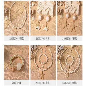 Detailansicht von Strand Stil Perlen Perlen und goldenen Seestern Schmuckset Varianten.