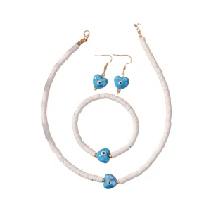 Witte kralen ketting armband en blauwe hart boze oog oorbellen sieraden set.