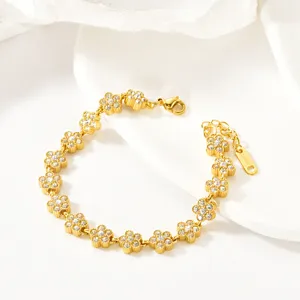 Gold four leaf flower rhinestone bracelet stainless steel luxury fashion jewelry for women.