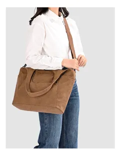Vintage canvas shoulder bag with large capacity, casual style, and durable daily use fabric.