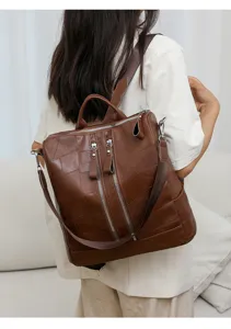 Sac à dos rétro en cuir PU pour femmes, design élégant, sac de voyage étanche et pratique.