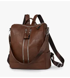 Vue détaillée du sac à dos vintage en cuir PU pour femme avec motif patchwork et doubles zips.