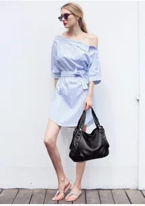 Detailed view of large capacity black leather shoulder handbag for women stylish everyday tote.