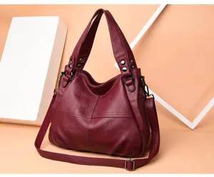 Large capacity wine red leather shoulder bag for women, stylish crossbody handbag.