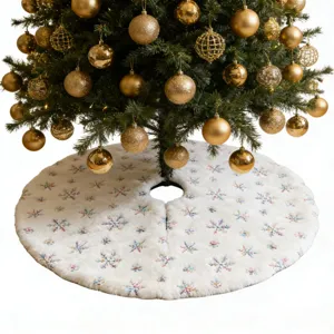 White plush Christmas tree skirt with embroidered snowflakes, festive holiday home decor item.