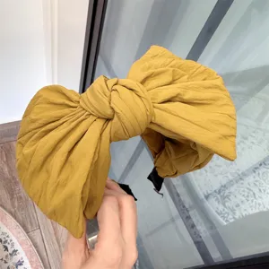 Serre-tête nœud papillon jaune pour femme, large bord style coréen accessoire de coiffure.