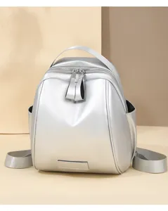 Silver shell backpack detail, stylish women's casual travel shoulder bag with zip design.