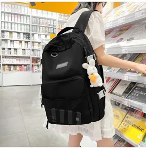 Zaino nero casual per studenti pendolari, design semplice di borsa scolaretta tinta unita.