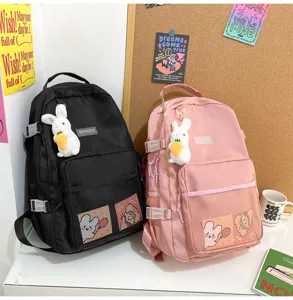 Zaino da studente casual con simpatico ciondolo in peluche di coniglio, borsa scolastica in nylon.