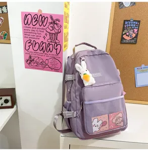 Zaino scolastico tinta unita casual in stile giapponese per studenti, borsa viola con peluche
