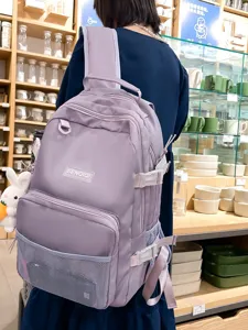 Zaino da studente minimalista in tinta unita casual, borsa scolastica viola chiaro per uso quotidiano.
