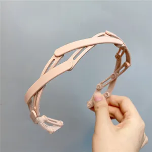 Foldable mesh headband for women, pink plastic teeth hair hoop for daily wash and travel use.