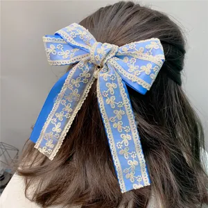 Blue double layer lace bow hair clip with elegant pearl pendant for sweet girl daily hair styling.