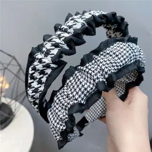 Houndstooth velvet ruffle headband, chic black and white hair hoop for women autumn winter fashion.