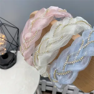 Close-up detail of organza rhinestone braided hair hoop, elegant sparkly design for daily wear.
