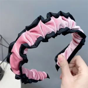Pink and black velvet ruffled headband for women, elegant winter hair hoop and accessories.
