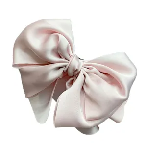 Pink satin large bow hair clip elegant French style sweet hair accessory for women.