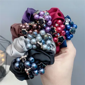 Satin hair scrunchies with pearls and beaded flower charms, elastic hair ties for women.