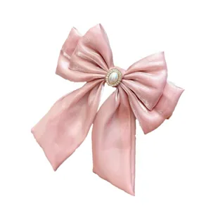 Pink satin bow hair clip with pearl and rhinestone accent, sweet lolita hair accessory.