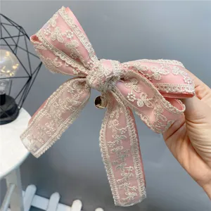 Pink lace bow hair clip with sweet pendant, elegant hair accessory for women and girls.