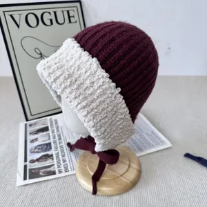 Winter plush spliced knitted hat with ties, warm thermal earflap beanie in wine red.