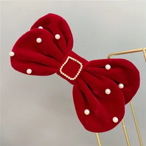 Red velvet bow hair clip with faux pearls and rhinestone square buckle for bridal wedding.