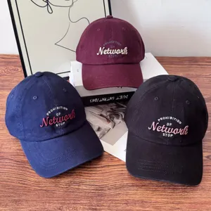 Retro letter embroidered baseball cap for men and women, casual cotton dad hat details.