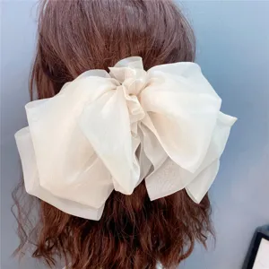 Oversized mesh bow hair clip for women, elegant three-layer organza spring hair accessory.