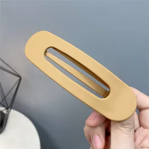 Acrylic hollow hair clip detail view, minimalist large hair claw for women daily styling.