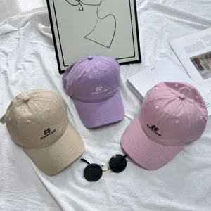 Washed cotton baseball cap for women and men, stylish letter embroidery casual hat.