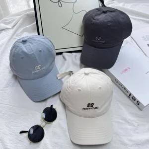 Washed cotton baseball cap with letter embroidery, casual dad hat for men and women.