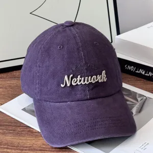 Vintage purple corduroy baseball cap for women and men, classic embroidered letter design.