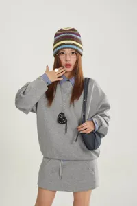 Stylish Korean style striped knit beanie hat for women, warm winter fashion accessory cold hat.