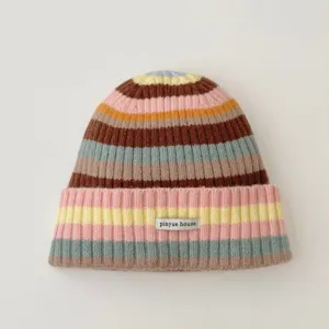 Colorful striped knitted beanie winter warm wool hat with letter label knit cap detail view
