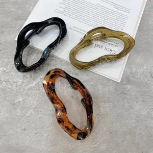 Large geometric acrylic hair claw clip set, stylish hollow hair accessories for daily wear.