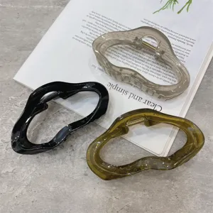Large irregular acrylic hair claw clip clear jelly color fashion hairpin for women styling.