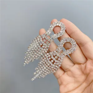 Long rhinestone tassel earrings for women, sparkling crystal dangling drop jewelry style.