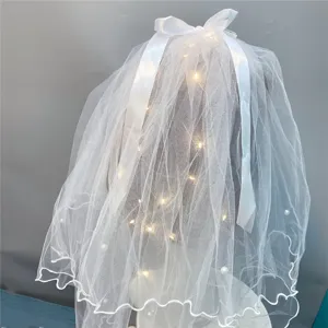 White bridal wedding veil with pearls, led fairy lights and bowknot hair clip for women.