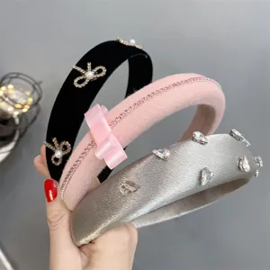 Stylish padded hair hoop set featuring crystal bows and rhinestones, comfortable for daily wear.