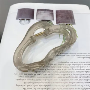 Transparent acrylic cloud hair claw clip, jelly color large hollow hair accessory detail.