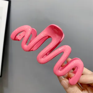 Pink wavy hair claw clip, sweet jelly color large size hair accessory for elegant styling.
