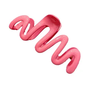 Pink wavy hair claw clip for women, large jelly color hair catch aesthetic hair accessory.