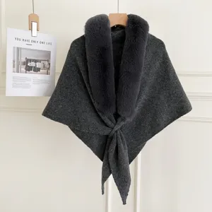 Dark grey knitted shawl with faux fox fur collar, winter warm cape and stylish triangular scarf.
